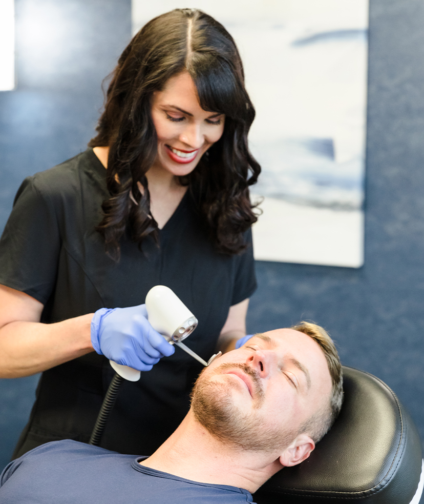 Photo of a man getting ADVATx® treatments at Synergi MedSpa